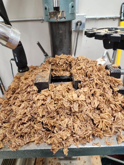 Drill press table full of shavings