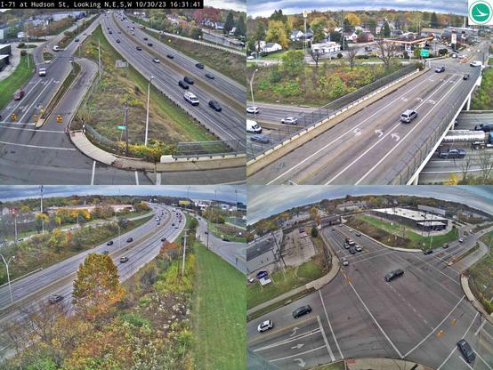 The image is split into four quadrants, each showing a different camera view of the Hudson Street bridge over I-71. The cameras appear to all be located on a pole at the southeast corner of the intersection of Silver Drive and Hudson Street. One camera looks northwest, focusing on the north approach of Silver Drive and the ramp from I-71, also capturing all lanes of I-71. One camera looks east, focusing on the bridge over I-71 and the intersection of the northbound ramp there. One camera looks south over both directions of I-71, with a view onto the southbound ramp. One camera watches the entire intersection of Hudson and Silver Drive, and the rail bridge over Hudson.