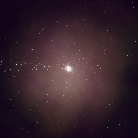 starry scene with a line stretching from the center and the stars closest to the line shining brighter