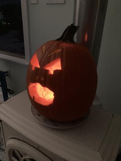 Jack O’Lantern screams. If you zoom in you can see the dental implant I gave him (half a toothpick) to keep his only tooth in place.