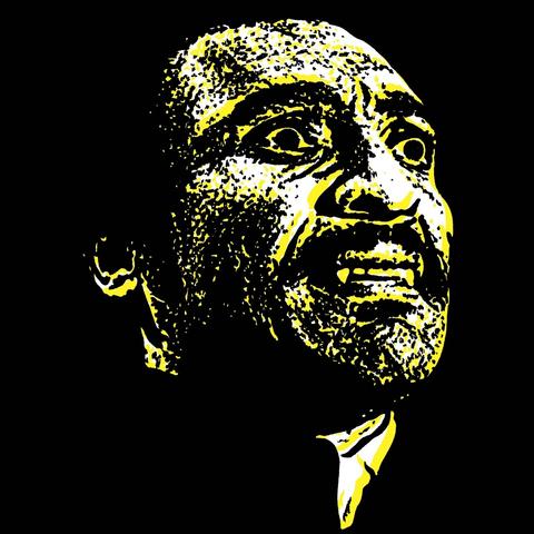 Yellow drawing of a black vampire emerging from a black background.
