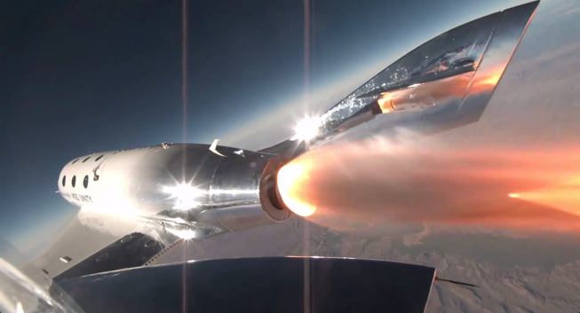 VSS Unity powers up it's hybrid propulsion system shortly after being released from the VMS Eve mothership.