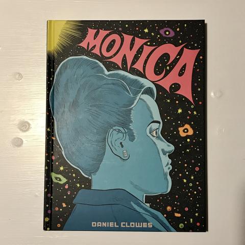 Photograph showing the cover of Daniel Clowes’s graphic novel, Monica: an illustration of the head of a young woman.