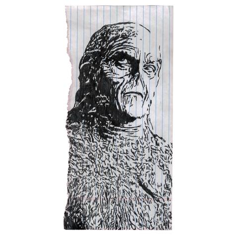 Pen drawing of a humanoid monster creature drawn on a torn notebook page.