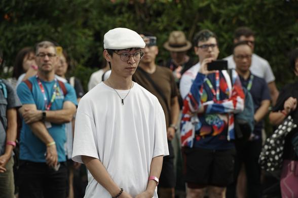 As part of #GayGames Hong Kong 2023, the AIDS quilt memorial ceremony was held on Saturday to commemorate those who died in the AIDS epidemic, and to raise awareness of HIV/AIDS.   Audience members were invited to add the names of those who've passed away from AIDS-related illnesses. The quilt - now hung at Central's Festival Village - also included the names of those who received previous dedications during past Gay Games. Photo: Gay Games.