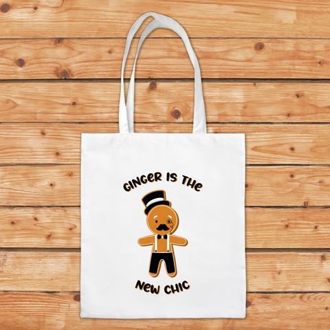 Tote bag de Noël représentant un bonhomme en pain d'épices fichtrement élégant et avec le texte "ginger is the new chic". A retrouver dans notre boutique en ligne : ernestine-etcie.fr