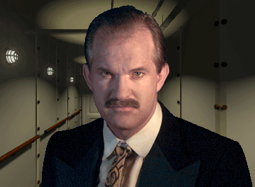 A screencap from the video game "Titanic Adventure Out of Time " showing a man (a photo of an actor) with a brown street sweeper mustache, a black suit jacket, a white dress shirt, and a dark good and black necktie. He is standing in an inner hallway of the Titanic.