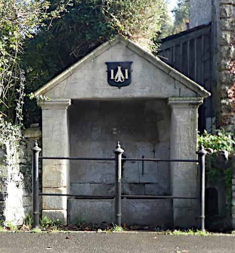 An classical building in miniature, with a black&white monogram