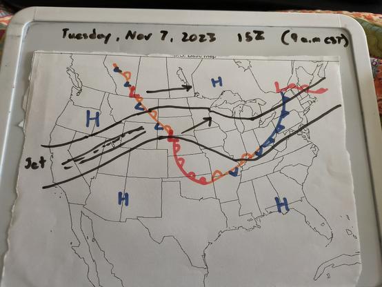 A hand drawn surface map of the weather fronts and pressure systems over the United States, southern Canada, and northern Mexico as of 9 a.m. on Tuesday, November 7, 2023.  It shows two lows exiting the Rockies and poised to ride the jet stream and a strong jet streak into the Northern Plains and western Great Lakes region.