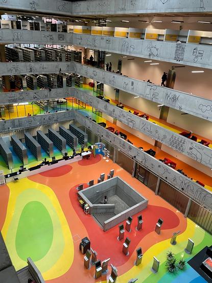 National Library of Technology Prague - picture of bright colours on floor taken looking down into the atrium from the 6th floor
