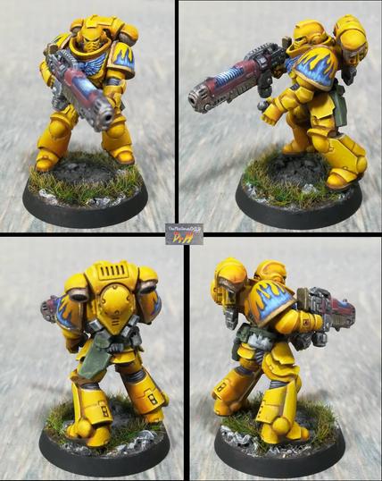 Hellblaster space marine reloading his weapon.