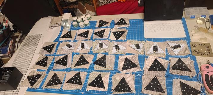 Are we going to need more fabric? Let's do some math. I think it's a 5:4 ratio of tiles to fabric blocks, but that just brings us to 40 tiles with the proposed layout. We are going to need more fabric or drop to 40 or less tiles for this particular design.