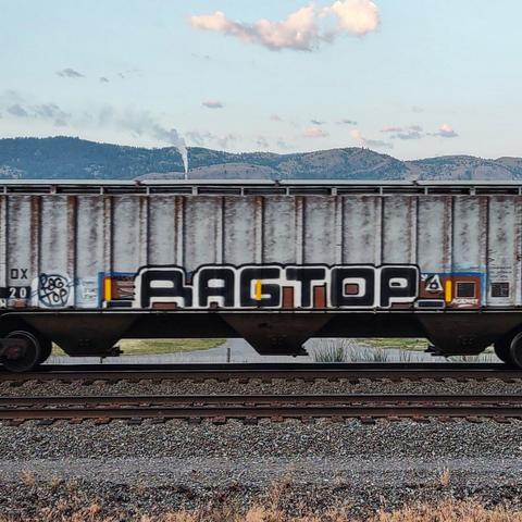 Train car with graffiti rolling through Kamloops BC Canada