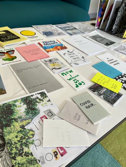 Table top with various zines