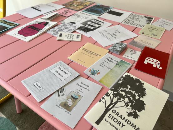 Table top with various zines