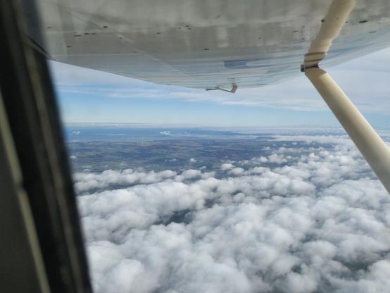Clouds below.