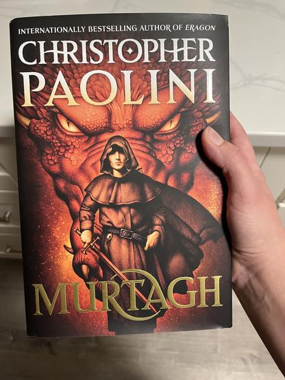 A picture of a book titled “Murtagh” by my teen nemesis, Christopher Paolini, the author responsible for the Eragon series and the first betrayal of my naive young life.