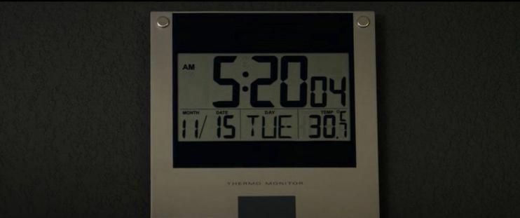 A clock showing the date as Tuesday, November 15
