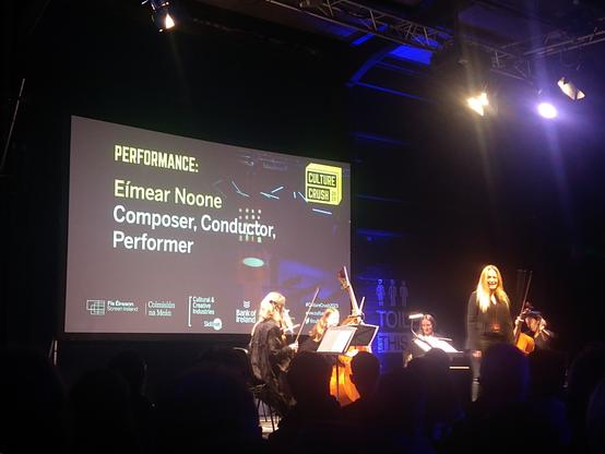 Eímear Noone performing with a string quintet at Culture Crush 2023.