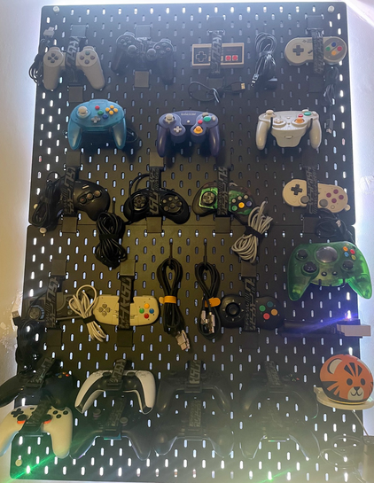 IKEA Skadis Pegaboard hold my various video game controllers