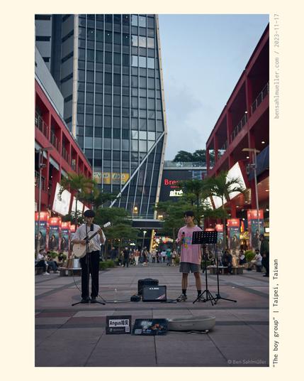 Two young man performing their music in the streets of Xinyi in Taipei.