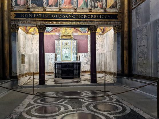 A dramatically lit marble chappel