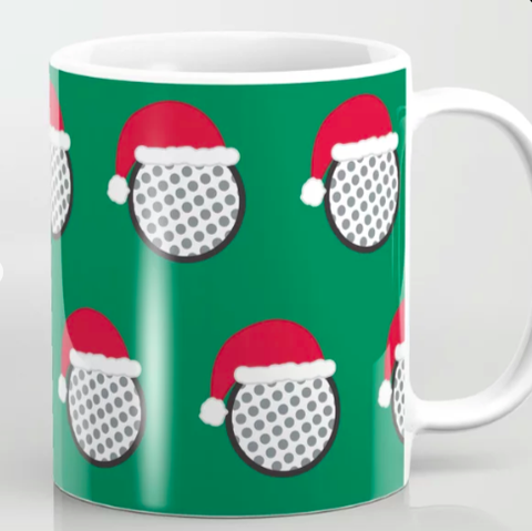 Our golf ball santa design is shown on a coffee mug.