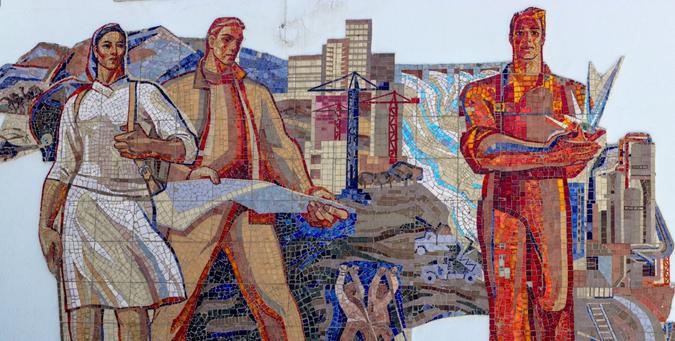 A tiled mosaic feturing a range of Soviet workers