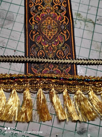 Brown and golden braid ribbon with a golden fridge/frilled ribbon underneath it.