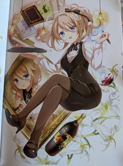 Aoyama Midori dressed in brown with some of her favorite things, books, pen, wine.