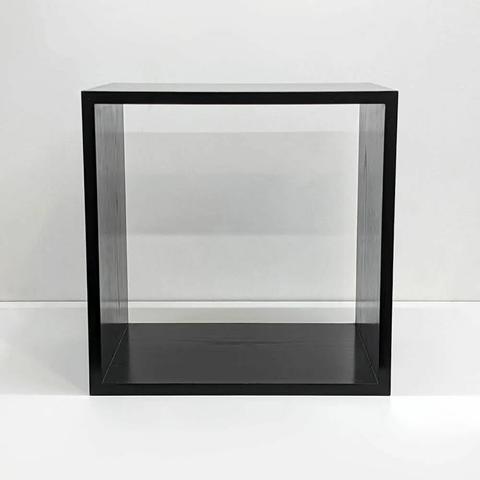 A stained black box with no back.
