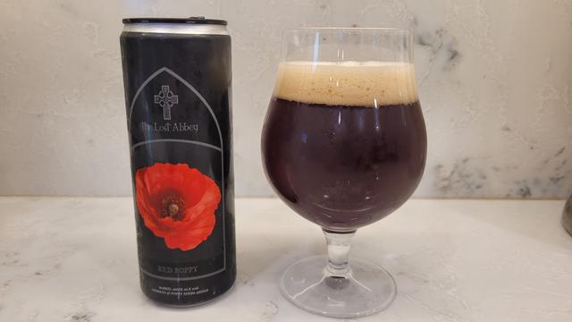 Beer can and glass of beer