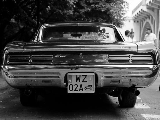 Black and white photo of a vintage American car