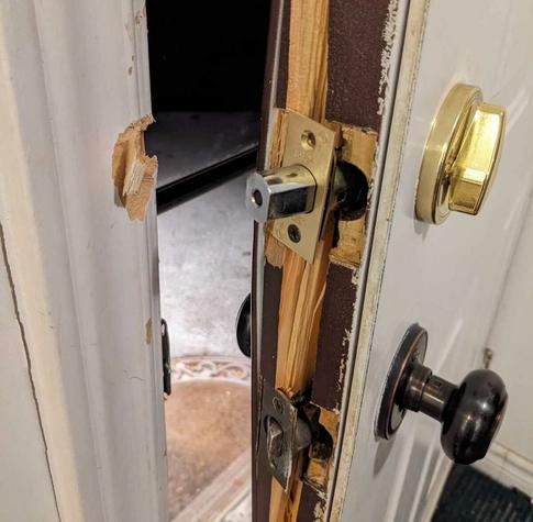 The wrong house.

The door to Bryanna Reilly's townhouse was smashed and damaged after she said Toronto police conducted a raid early Wednesday morning.
Bryanna Reilly