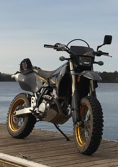 Picture of Suzuki DRZ400SM with extra tread on the tires for off road traction