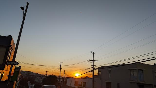 Sunrise through the wires.