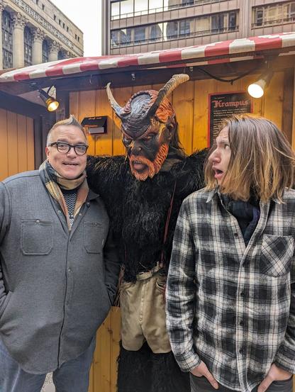 Me and the teen, with a life-sized Krampus, pretending to be scared.