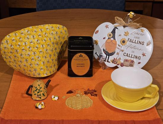 A tea tableau for bees in late Autumn. The tea is Golden Monkey black tea from Harney and Sons.