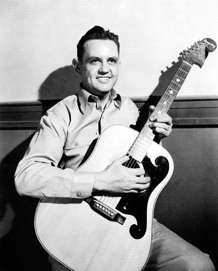 Photo of Merle Travis and his guitar
