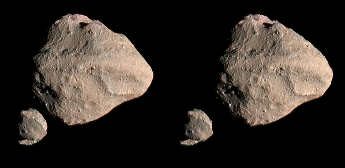 A pair of crossview stereoscopic images of the asteroid Dinkinesh and its satellite, Selam, created using data collected by the L’LORRI camera on the NASA Lucy spacecraft in the minutes around closest approach on Nov. 1, 2023. These images have been processed to enhance contrast, and the apparent distance between Selam and Dinkinesh has been artificially reduced to facilitate simultaneous stereo view of the two objects. Credit: NASA/Goddard/SwRI/Johns Hopkins APL/NOIRLab for the original images/Brian May/Claudia Manzoni for stereo processing of the images.

I colorized this stereo image using a false color image from the lower resolution MVIC instrument. The orange, green and violet MVIC filters were mapped to the red, green, and blue channels to create this image. Image Credit: NASA/Goddard/SwRI