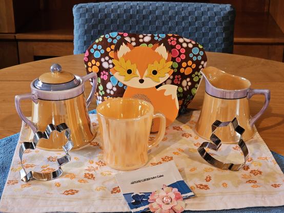 A Fall tea tableau to say goodbye to November. The tea is Almond Cardamom Cake rooibos from Adagio.