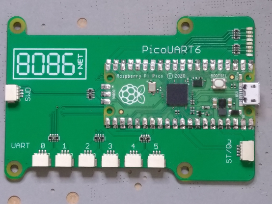 PicoUART6 board with a Raspberry Pi Pico soldered directly onto it.