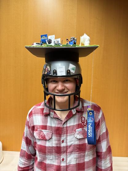 Daniel Krieger with his handcrafted PhD hat.