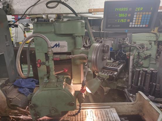 surface grinding some metal to make new very flat vice jaws.