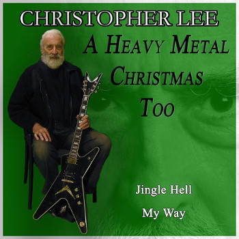 Christopher Lee sitting on a chair with a guitar