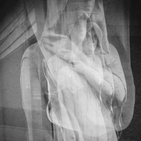 black and white photograph of a cemetery statue. triple exposure on a vintage diana camera depicting a mysterious hooded human figure, androgynous, mysterious