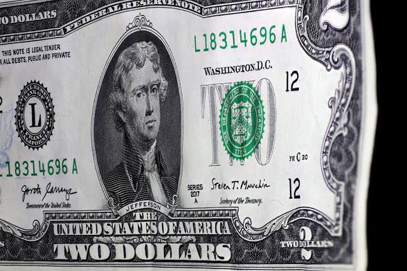 Playing around with a 56 year old 1967 El-Nikkor enlarger lens reversed mounted on a bellows 
Stacked closeup of a 2 dollar bill.  I think the detail is great for a old lens.