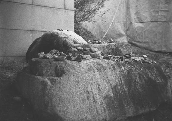 Wishes. Wishmakers built small towers by stacking small stones.