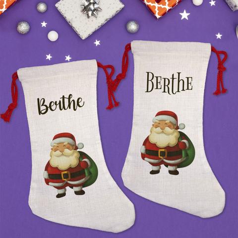 Chaussette de Noël façon chanvre au motif de Père Noël tout rond à personnaliser avec le prénom de votre choix. A retrouver dans notre boutique en ligne : ernestine-etcie.fr