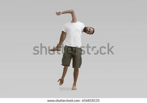 [Shutterstock Stonk Pic]
A man with an arm for a head, a head for an arm, a leg for an arm and an arm for a leg. He is wearing a plain white tee and army green khaki shorts.